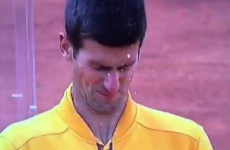 Djokovic nearly takes his eye out by showing how NOT to open a bottle of champagne