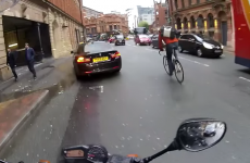 This cyclist had an incredibly close call with a bus after breaking a red light