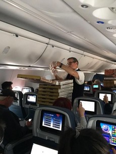 Passengers get stuck on runway, so airline orders pizza for everyone