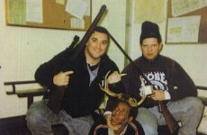 Released photo shows prisoner dressed as prey between police officers with shotguns