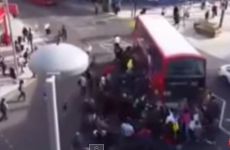 Watch the moment a huge crowd lifted a double decker bus off a trapped unicyclist
