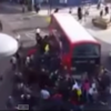 Watch the moment a huge crowd lifted a double decker bus off a trapped unicyclist