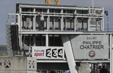 Play at French Open halted after part of a giant TV screen falls onto fans