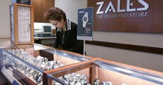 New York cop charged with using dead man's credit card to buy a diamond ring
