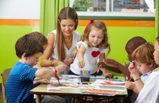 Why do childcare workers earn such low wages while parents pay high fees?