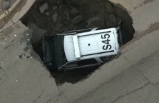 A giant sinkhole ate this police car...