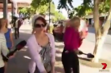 A woman was caught on camera stubbing out her cigarette on a reporter's face