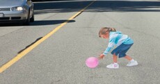 3D image of girl painted on road to shock drivers