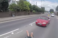 This cyclist cut in front of a car and got some instant karma