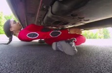 A woman managed to limbo under a car and the video will break your brain