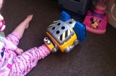 Five firefighters had to rescue a little girl who got her foot stuck in a toy robot