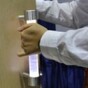 This futuristic bathroom door handle has a trick up its sleeve