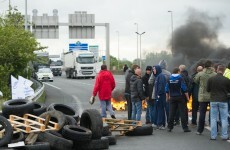 Channel Tunnel chaos as protesters burn tyres on train tracks