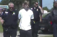 Watch: Officers high-five as the US's most wanted man is calmly arrested by small-town cops