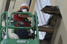 District attorney to examine balcony collapse as report blames rotten wood