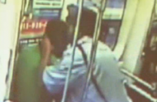 Police officer chokes a man holding his daughter
