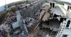 Air force plane crashes into city killing at least 140