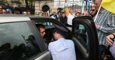 Senators abandon cars after protesters shut down street outside Leinster House