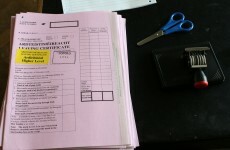 Investigation underway after examiner pictured correcting Leaving Cert paper on a train