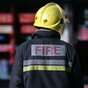 Firefighter rushed to hospital after breathing equipment failure