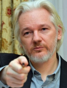It's Julian Assange's birthday and he's spending it arguing with the Republic of France