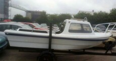 Gardaí are trying to find owners for 10 boats and a caravan