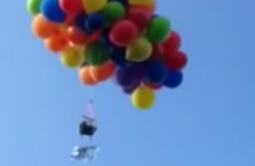 Man takes to the sky in deck chair suspended by 120 balloons