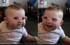 The internet can't cope with this baby girl trying on her glasses for the first time