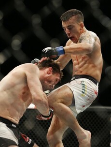 Thomas Almeida nearly decapitated Brad Pickett with a flying knee tonight