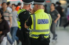 Man arrested on London train for charging phone