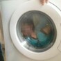 A woman shut a toddler in a washing machine for a 'laugh' and no one was impressed