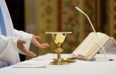 Priest injured in knife-point robbery says Mass before going to hospital