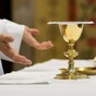 Priest injured in knife-point robbery says Mass before going to hospital