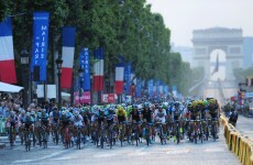 Paris police open fire on car that tries to crash through Tour de France barricade