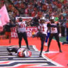 American football team celebrate with a glorious recreation of 'The People's Elbow'