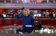 A BBC newsreader was caught brushing her hair, and totally owned it