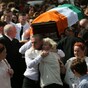 Murdered ex-IRA man laid to rest - as three people are questioned over his killing