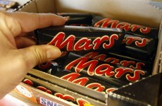 A woman fined for stealing a Mars bar has been given nearly €20,000 to pay it