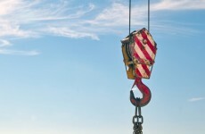 Three men injured after falling from crane onto a boat