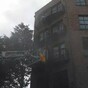 Pics: Woman rescued from Dublin apartment balcony after fire started in bedroom