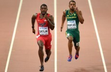 Gatlin greeted by boos as he cruises into world 100m semi-finals with Bolt