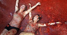 PHOTOS: 20,000 people pelt each other with tomatoes