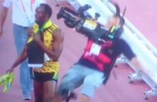Usain Bolt was flattened by a cameraman on a Segway after his 200m win