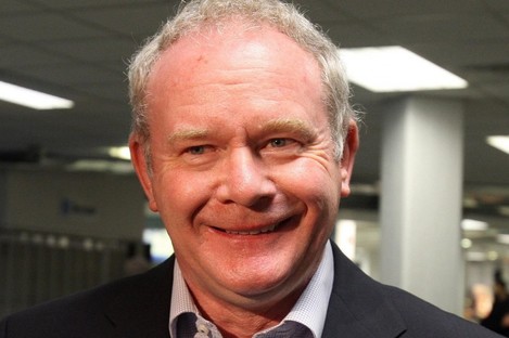 Martin McGuinness at Belfast Airport yesterday