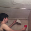 This guy's standoff with a spider hanging out in his bathroom is tense as hell