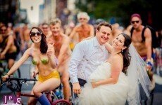 Thousands of naked cyclists photobomb wedding shoot