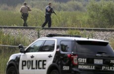 Police hunt for three suspects after officer is shot dead