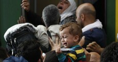 Desperate migrants storm Budapest station after two day stand-off