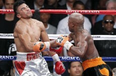 Floyd Mayweather's fiancée predicts fourth-round victory; wins $2,000