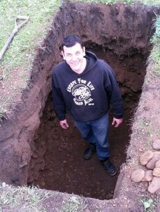 Escape artist almost dies following 'buried alive' charity attempt